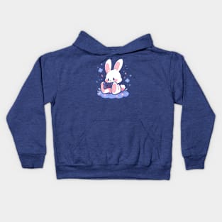 A tiny rabbit playing video games Kids Hoodie